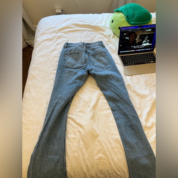 24 inch waist, dark blue, rips in knees - Picture 2 of 3